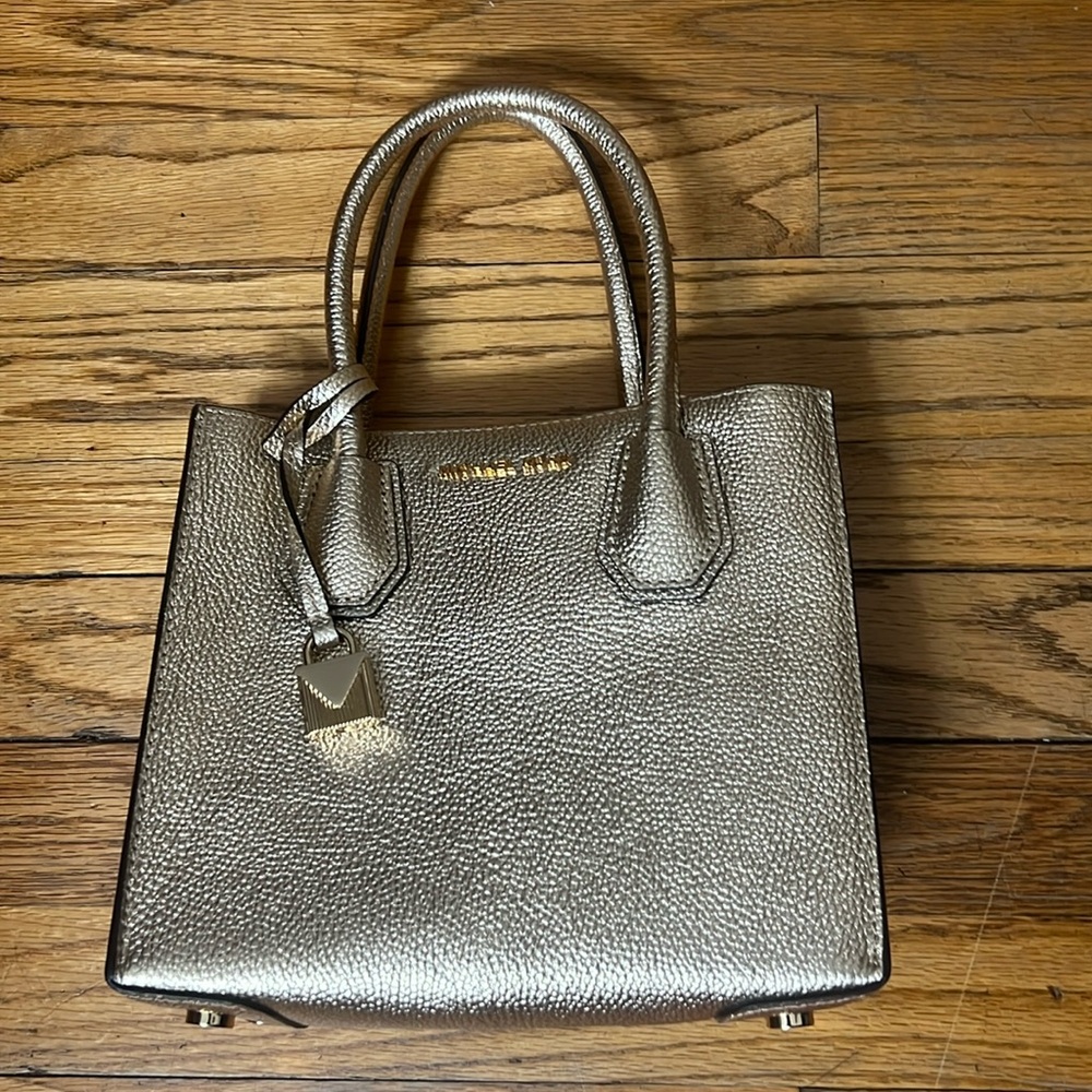 Michael Kors gold handbag. Never used.